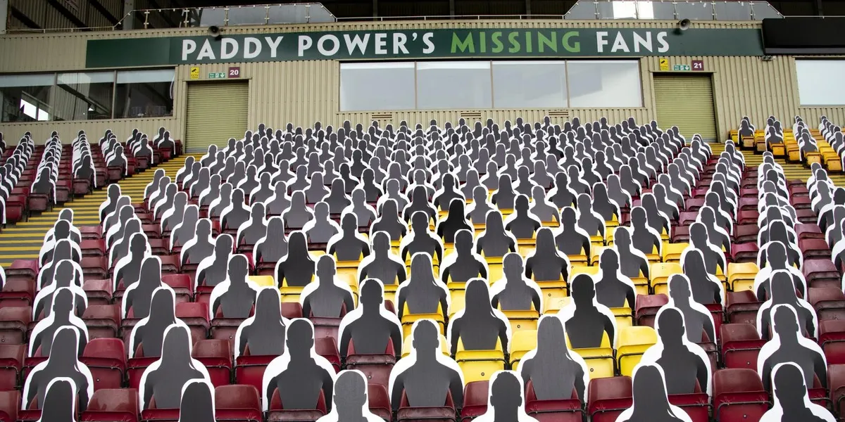 The South Stand at Motherwell FC's Fir Park, filled row-to-row with 1,190 blank black cardboard silhouettes in place of fans, in the absence of crowds during Covid-19.